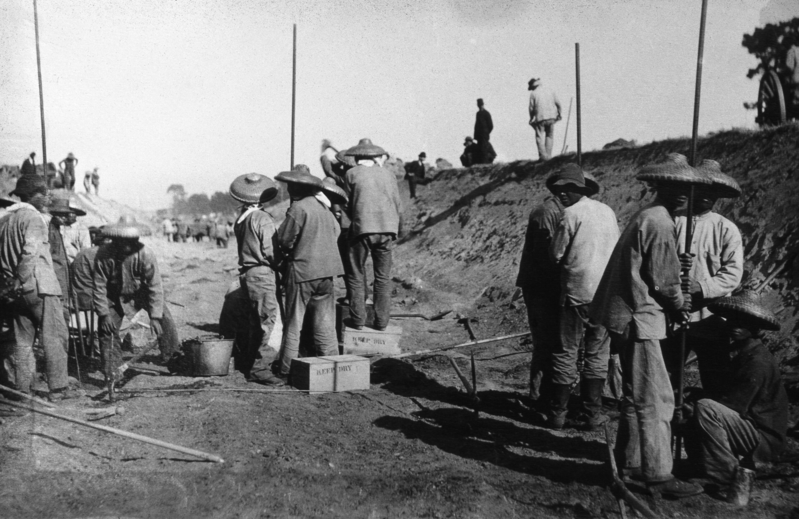 Chinese workers tamping powder into blast holes on the Pacific Grove Extension, 1889
